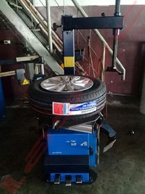 Tyre Changer Hofmann monty 1000 helper arm