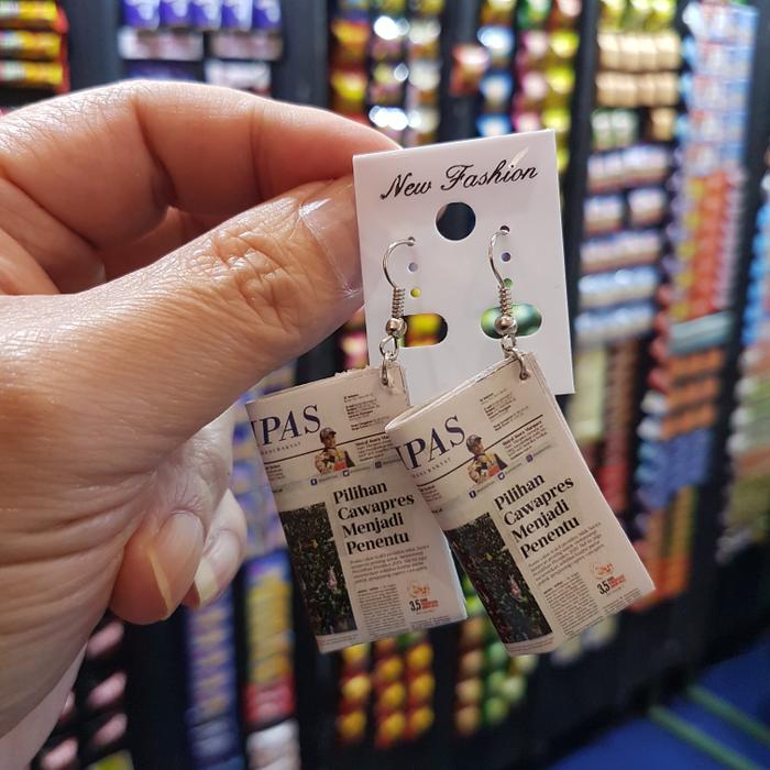 Anting koran Kompas