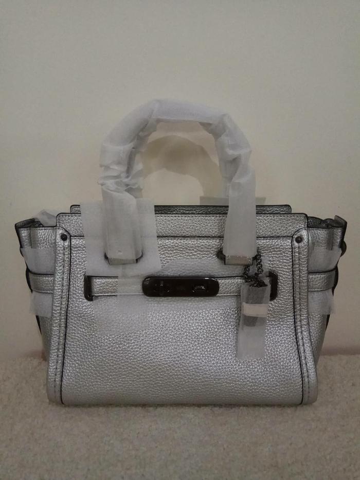 Tas Coach Swagger 27 Silver NWOT