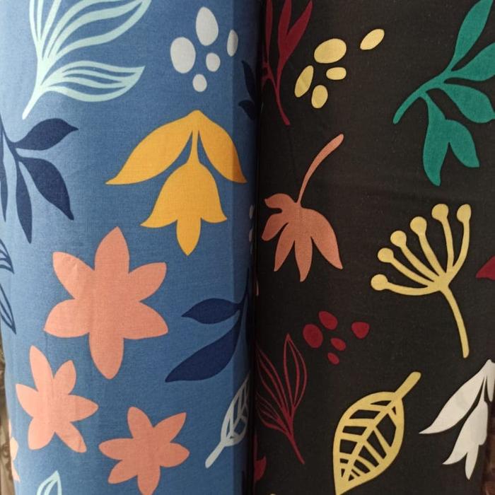 kain bahan baju meteran katun rayon motif daun dasar hitam